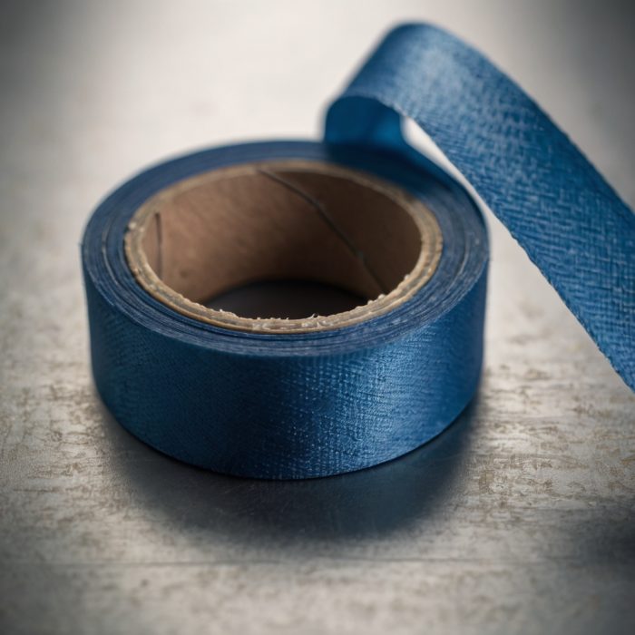 Portrait_Perfect_blue_Fabric_tape_on_metall_table_1